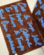 French Phrase Tuft Mat