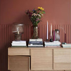 Stylish lamp with a noble finish