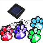 Solar lamp in paw print design – LED garden lighting in multicolor for outdoor use