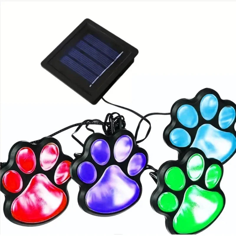 Solar lamp in paw print design – LED garden lighting in multicolor for outdoor use