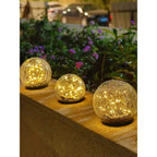 LED garden lights in crackle glass look – solar ball lamps for outdoor use and decoration