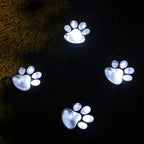 Solar lamp in paw print design – LED garden lighting in multicolor for outdoor use