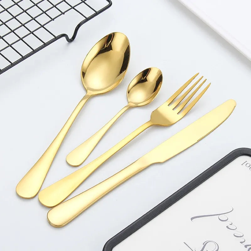 Opulent Gold Cutlery Set - The elegant 24-piece gold and silver cutlery set