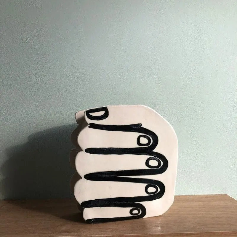 Hand Holding Flowers Vase