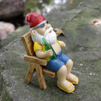 Sunbathing Gnome Statue made of Resin with Lounger for Garden Decoration