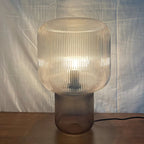 Stylish lamp with a noble finish