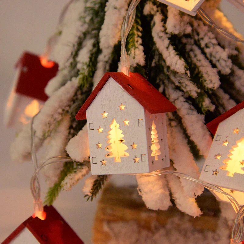 Wooden Christmas houses with LED lighting for festive decoration