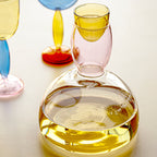 Chalice and carafe made of colored glass by Phillips