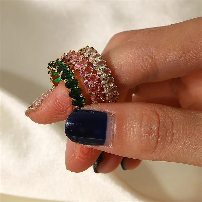 Dainty Oval Cut Diamond Adorned Ring