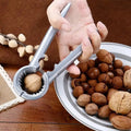 Nutoro Nutcracker made of metal | Multifunctional for walnuts, chestnuts, almonds & hazelnuts | Ergonomic handle | Silver