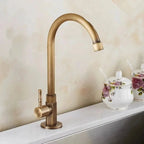 Antique brass swan neck tap for kitchen