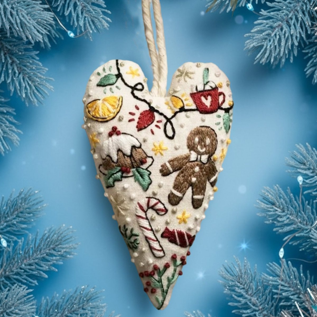 DIY embroidery set for heart-shaped Christmas decorations with fabric, thread, and needles