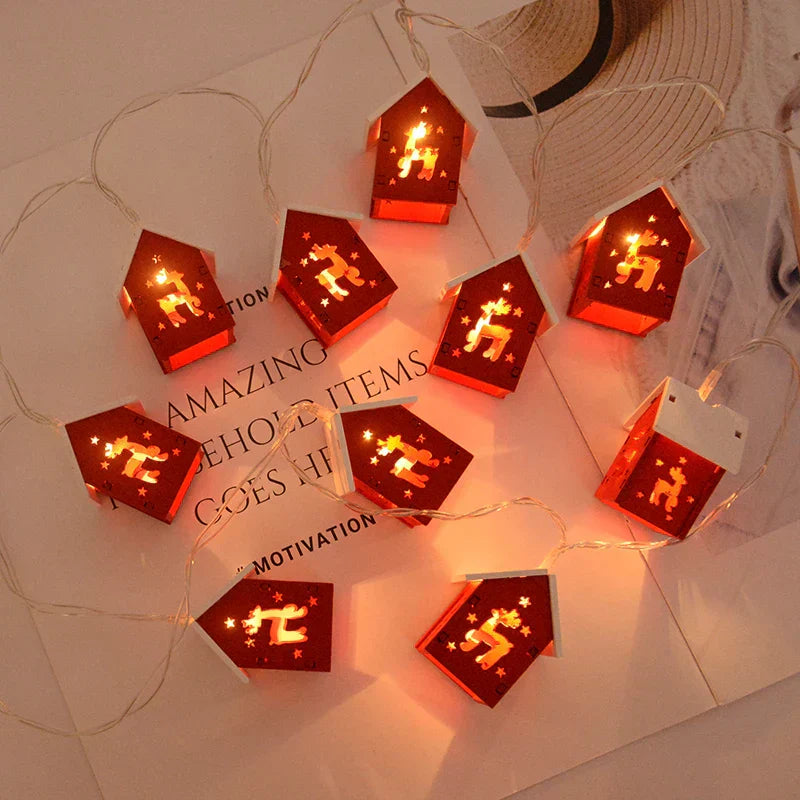 Wooden Christmas houses with LED lighting for festive decoration