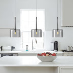 Pendant lamp for the dining table made of glass