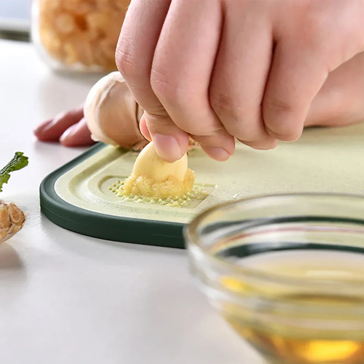 Practical cutting board with garlic mill