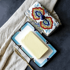 Hand-painted butter board with floral pattern