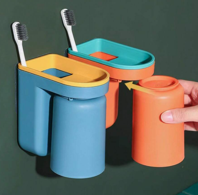 Adhesive toothbrush holder