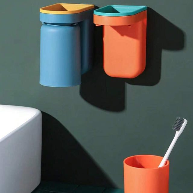 Adhesive toothbrush holder