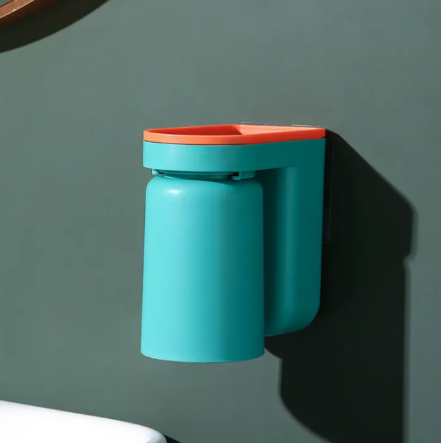 Adhesive toothbrush holder