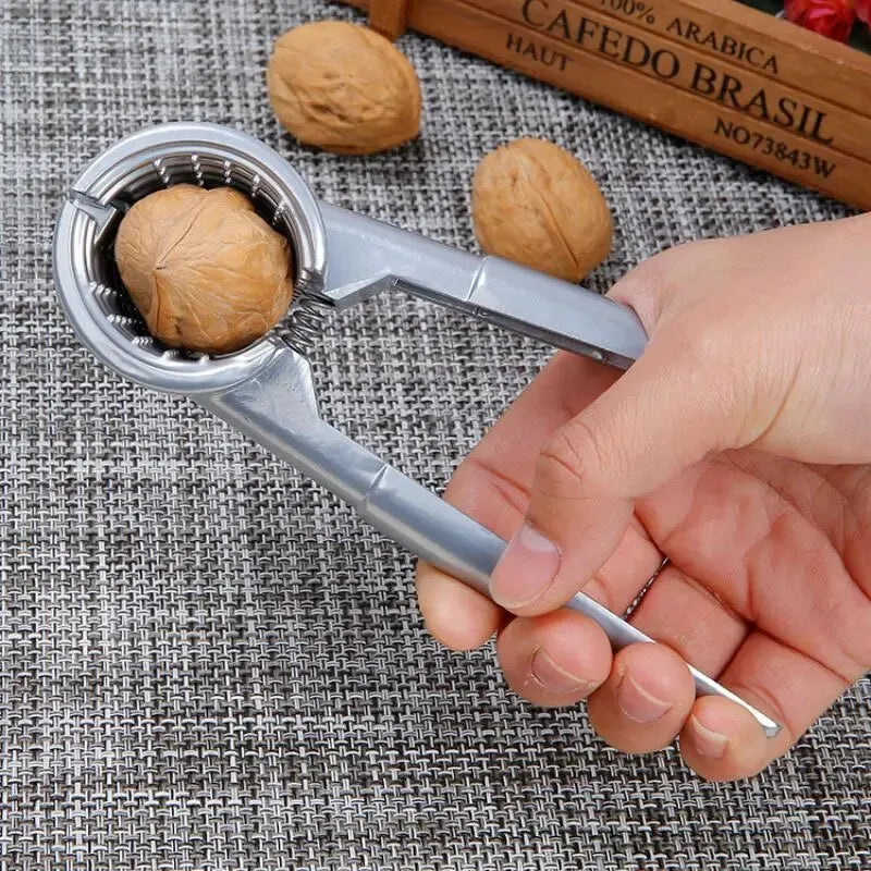 Nutoro Nutcracker made of metal | Multifunctional for walnuts, chestnuts, almonds & hazelnuts | Ergonomic handle | Silver