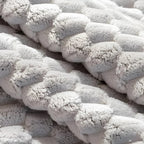 Luxurious velvet sofa cover with textured pattern