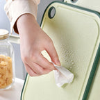 Practical cutting board with garlic mill