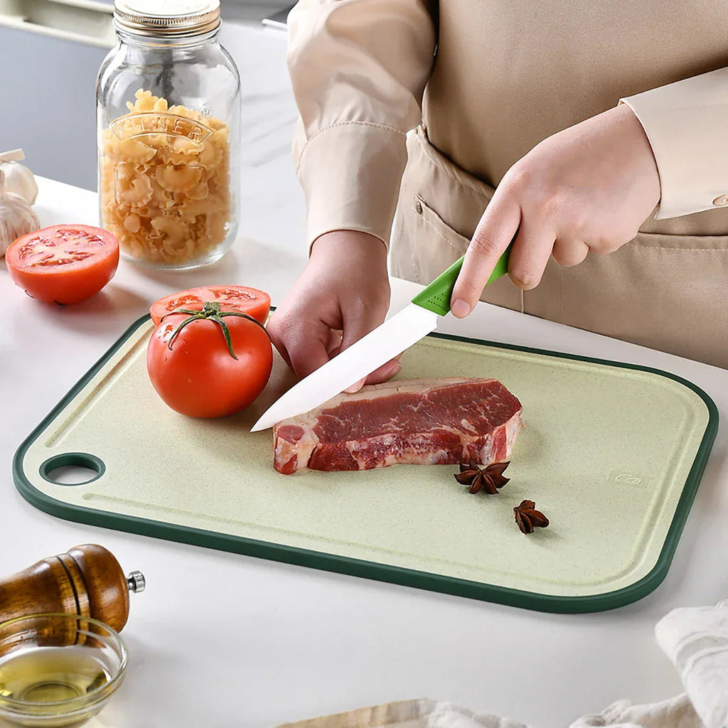 Practical cutting board with garlic mill