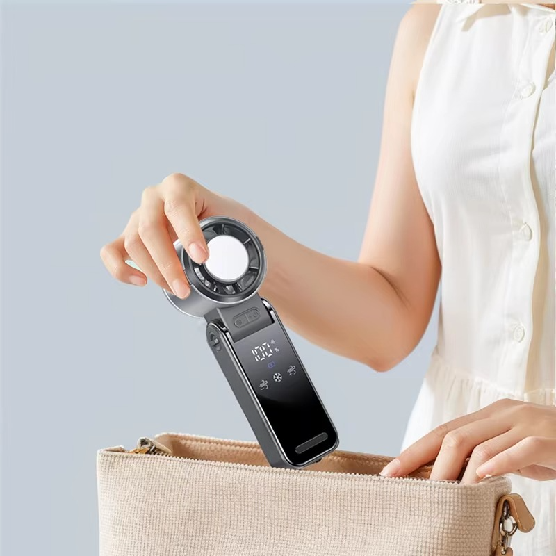 Foldable Turbine Handheld Fan with Integrated Ice Pack