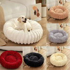 Round donut dog bed made of plush with non-slip bottom