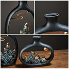 Detailed mountain patterns in an elegant vase