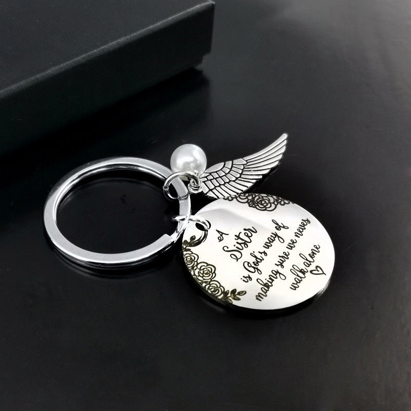 A sister is God's way of making sure we never walk alone keychain