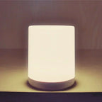 Dimmable LED table lamp with USB connection for flexible light
