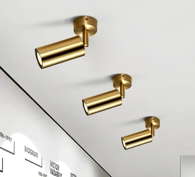 Modern swiveling LED ceiling light in gold – Adjustable lighting for living and working areas