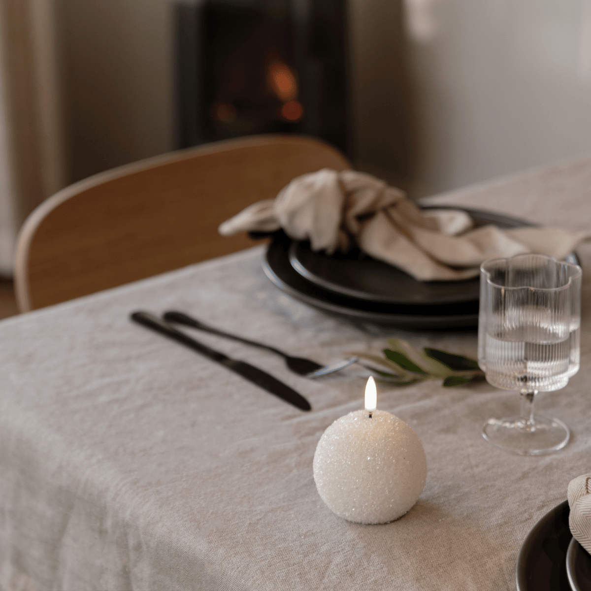 WinterShine – Elegant LED Candle in Snow Globe Design