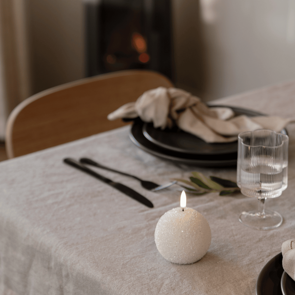 WinterShine – Elegant LED Candle in Snow Globe Design