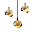 Elegant pendant light made of gold glass for dining room