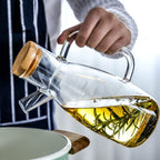 Transparent glass oil bottle with handle