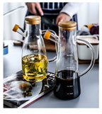 Transparent glass oil bottle with handle