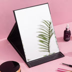 Compact makeup mirror with stand