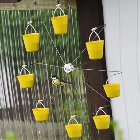 Bird feeder station in ferris wheel design