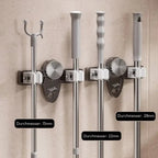 Space-saving holder for brooms & tools – Quickly mounted, no drilling