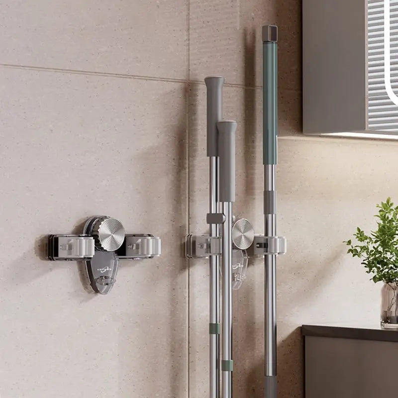 Space-saving holder for brooms & tools – Quickly mounted, no drilling