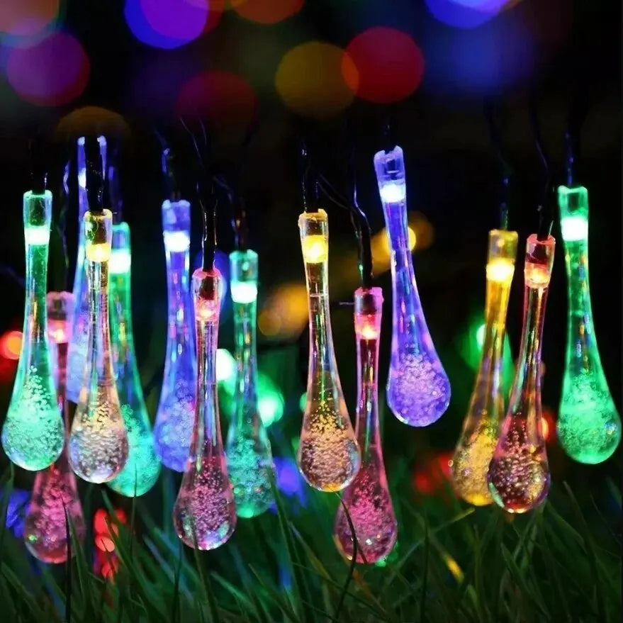 Solar-powered dew drop string lights for garden, waterproof LED decorative lighting for outdoor areas