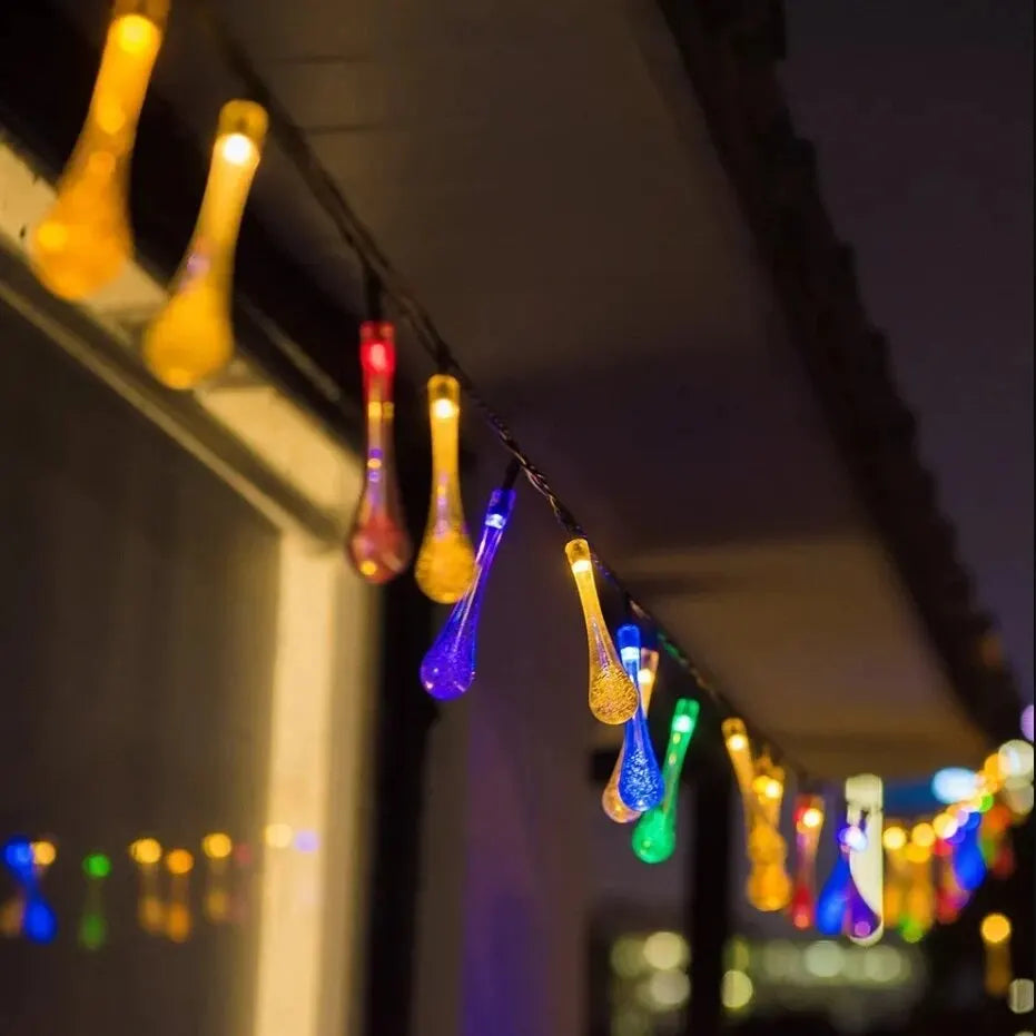 Solar-powered dew drop string lights for garden, waterproof LED decorative lighting for outdoor areas
