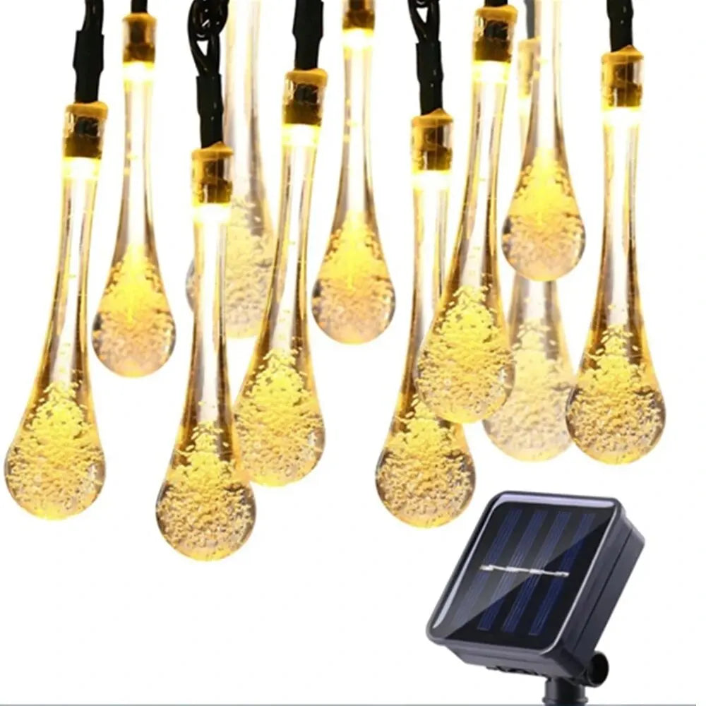 Solar-powered dew drop string lights for garden, waterproof LED decorative lighting for outdoor areas