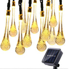 Solar-powered dew drop string lights for garden, waterproof LED decorative lighting for outdoor areas