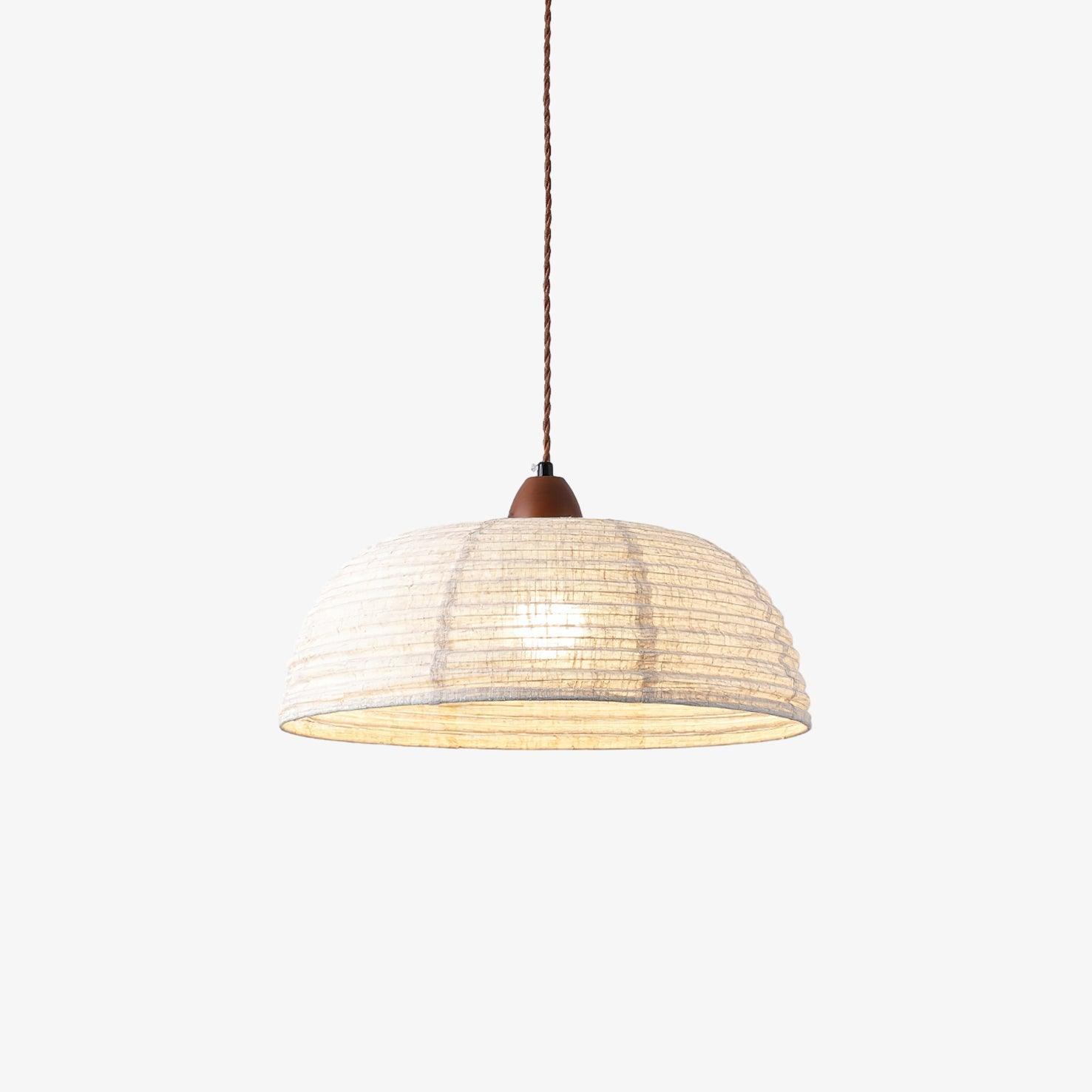 Pendant lamp with natural materials and subtle light