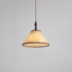 Pendant lamp with natural materials and subtle light