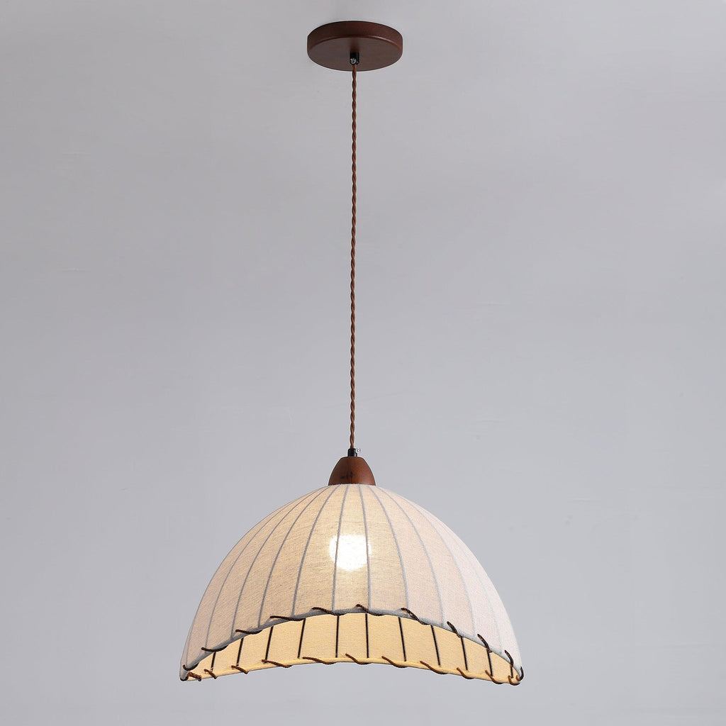 Pendant lamp with natural materials and subtle light
