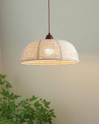 Pendant lamp with natural materials and subtle light